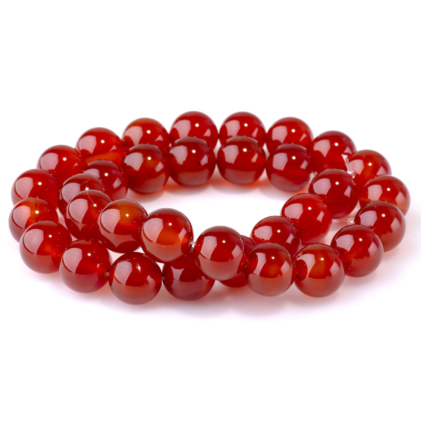 This is a Dakota Stones 12mm Carnelian Gemstone strand with round beads in 15-16 inch strand.