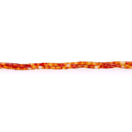 This is a Dakota Stones 2x4mm Carnelian Tube Gemstone strand of round beads in 15-16 inch strand.