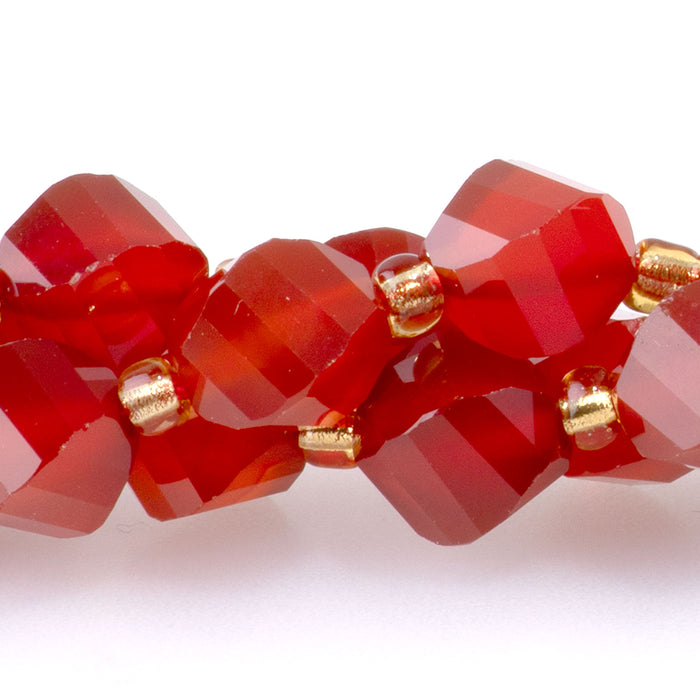 Carnelian 7x8mm Faceted Swirl Oval - 15-16 Inch