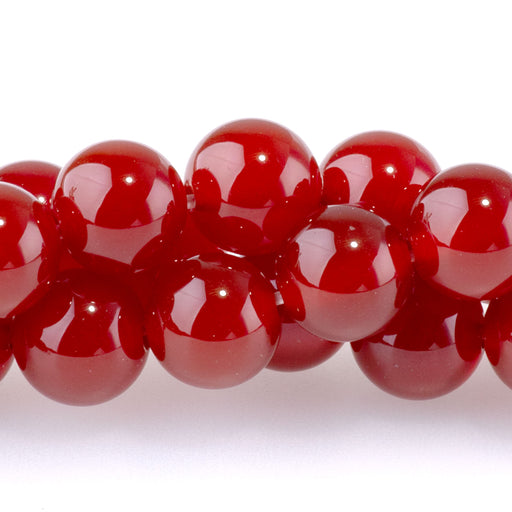 This is a Dakota Stones 8mm Carnelian Gemstone strand with round beads in 15-16 inch strand.