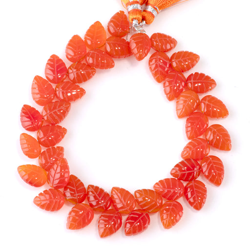This is a Dakota Stones 8x11mm Carnelian Leaf Gemstone strand of round beads in 8 inch strand.