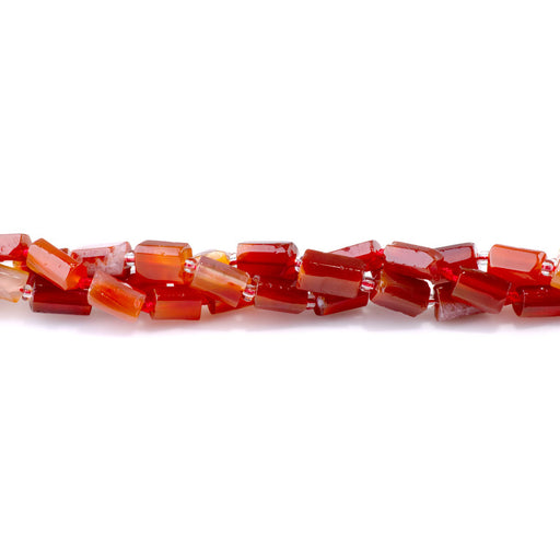 This is a Dakota Stones 8x12mm Carnelian Tube Simple Cut Gemstone strand of round beads in 15-16 inch strand.
