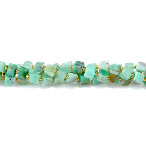 This is a Dakota Stones 6-7mm Chrysoprase Gemstone strand with irregular cube beads in 15-16 inch strand.