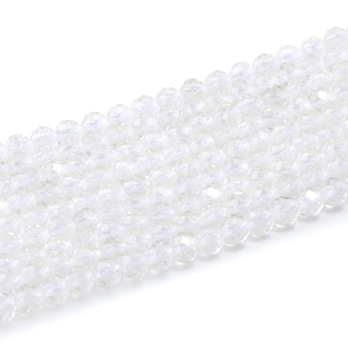 This is a Dakota Stones 4mm Crystal Quartz Microfaceted Gemstone strand with round beads in 15-16 inch strand.