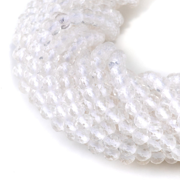 This is a Dakota Stones 4mm Crystal Quartz Microfaceted Gemstone strand with round beads in 15-16 inch strand.
