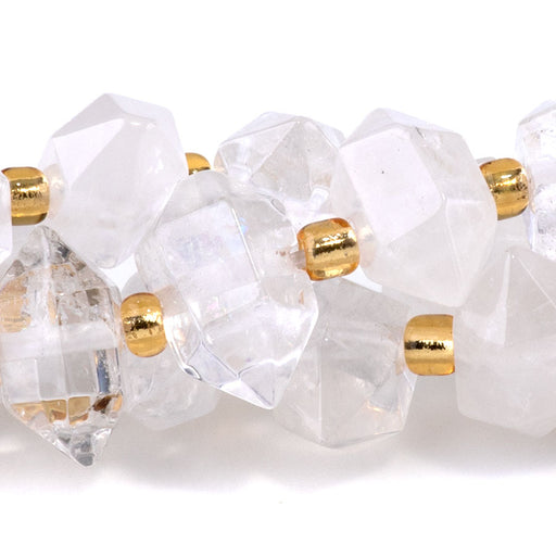 This is a Dakota Stones 6x11mm Crystal Quartz Points Gemstone strand of round beads in 15-16 inch strand.