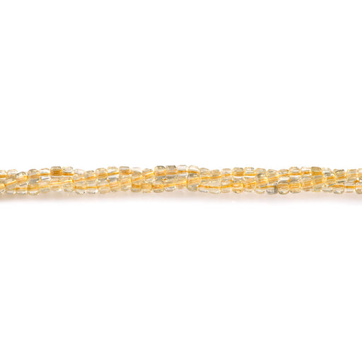 This is a Dakota Stones 3mm Citrine Gemstone strand with A grade table-cut cube beads in 15-16 inch strand.