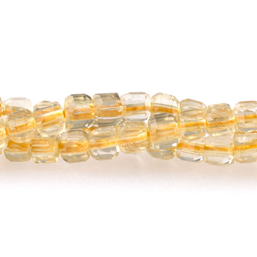 This is a Dakota Stones 3mm Citrine Gemstone strand with A grade table-cut cube beads in 15-16 inch strand.