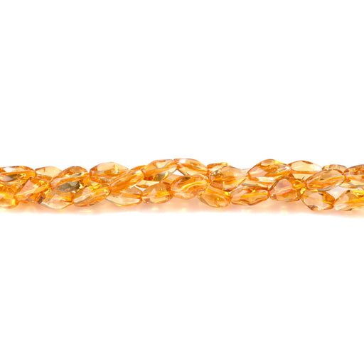 This is a Dakota Stones Citrine Smooth Gemstone strand with nugget beads in 15-16 inch strand.