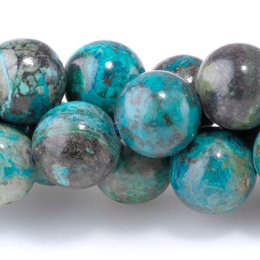 This is a Dakota Stones 10mm Peruvian Chrysocolla Gemstone strand with round beads in 15-16 inch strand.