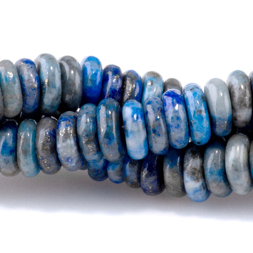 This is a Dakota Stones 2x6mm Denim Lapis Thin Gemstone strand with rondelle beads in 15-16 inch strand.