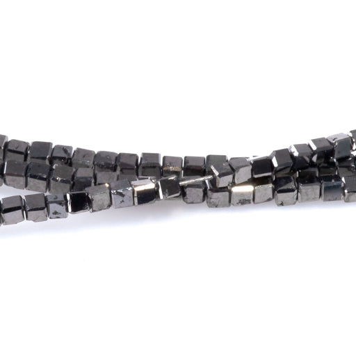 This is a Dakota Stones 2mm Black Diamond Gemstone strand with cube beads.