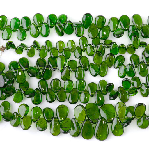 This is a Dakota Stones 4x6-8x12mm Diopside Top Drill Gemstone strand with drop beads in 15-16 inch strand.