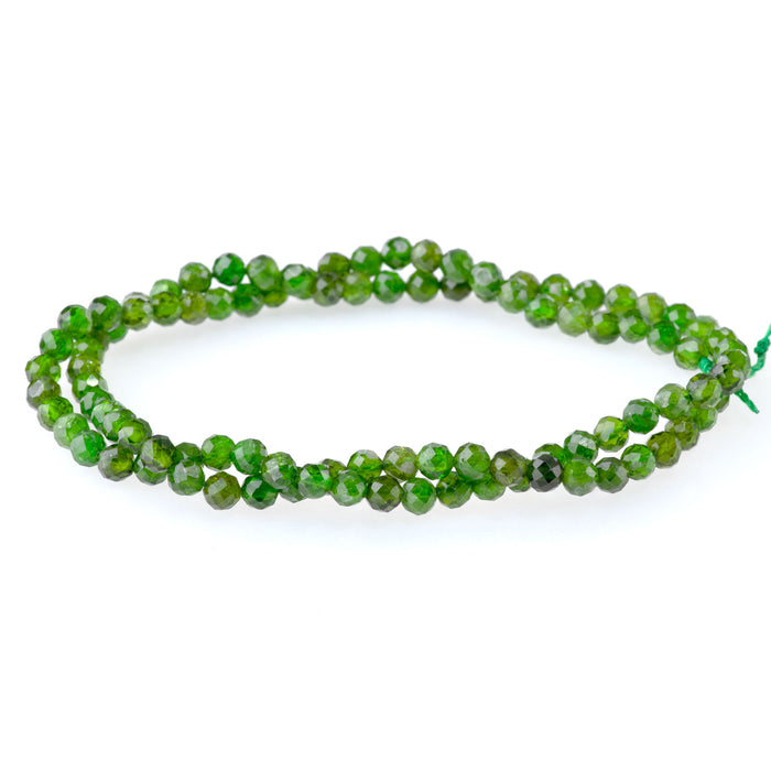 This is a Dakota Stones 4mm Diopside Gemstone strand with AA grade faceted round beads in 15-16 inch strand.