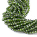 This is a Dakota Stones 4mm Diopside Gemstone strand with AA grade faceted round beads in 15-16 inch strand.