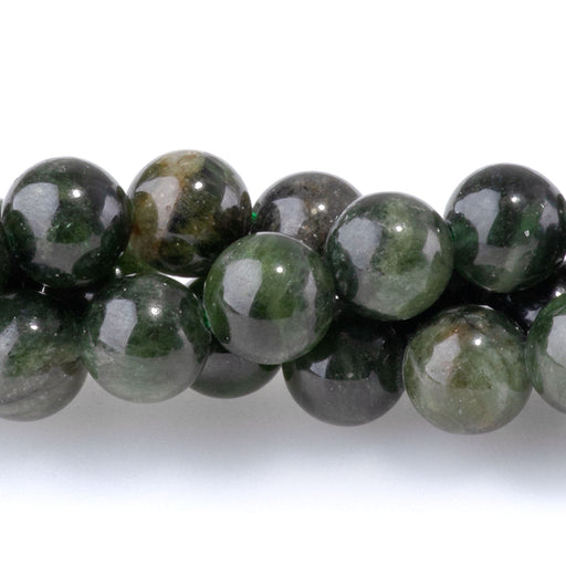 This is a Dakota Stones 6mm Diopside Gemstone strand with round beads in 15-16 inch strand.