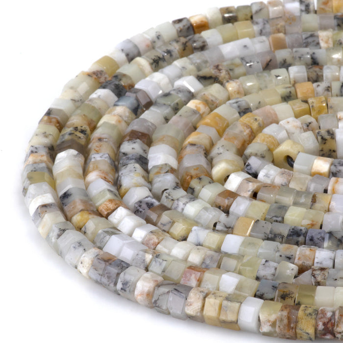 This is a Dakota Stones 6mm Dendritic Opal Large Hole Gemstone strand with faceted hexagon beads in 8 inch strand.