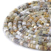 This is a Dakota Stones 6mm Dendritic Opal Large Hole Gemstone strand with faceted hexagon beads in 8 inch strand.