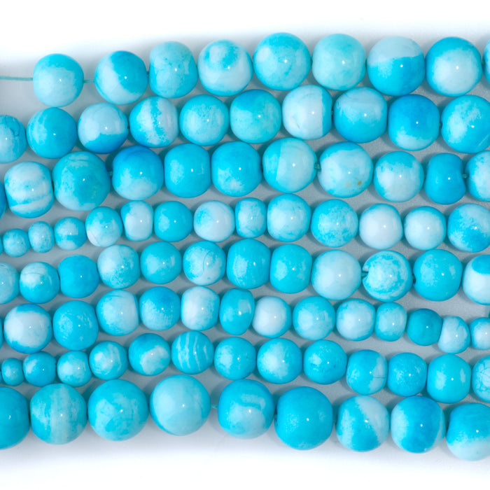 Opal (Dyed) 4-7x10-11mm Sky Blue Graduated Irregular Round - 15-16 Inch