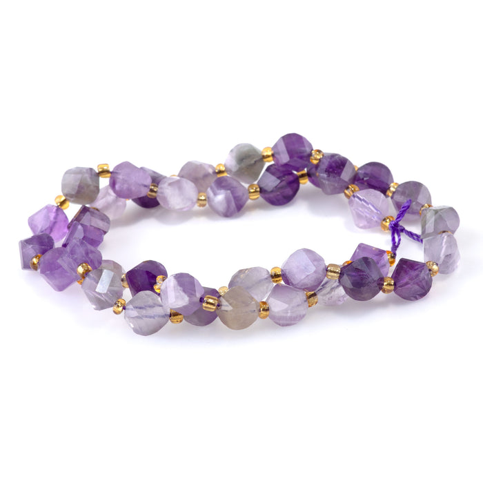 Dog Teeth Amethyst 7x8mm Faceted Swirl Oval - 15-16 Inch