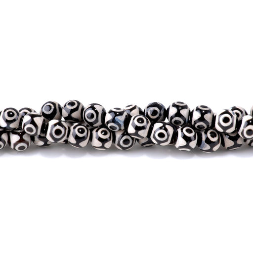 This is a Dakota Stones 10mm DZI Three Eye Agate Black Gemstone strand with round beads in 15-16 inch strand.