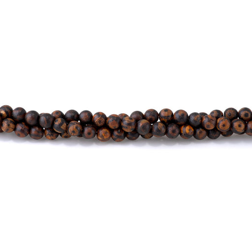 This is a Dakota Stones 6mm DZI Eye Agate Black Brown Gemstone strand with round beads in 15-16 inch strand.