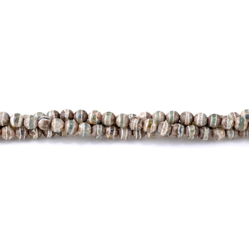 This is a Dakota Stones 6mm DZI Line Agate Green Gemstone strand with round beads in 15-16 inch strand.