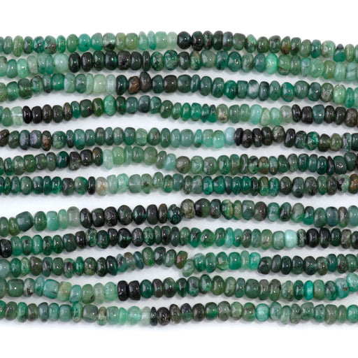 This is a Dakota Stones 2-4mm Emerald Banded Gemstone strand with irregular rondelle beads in 14 inch strand.