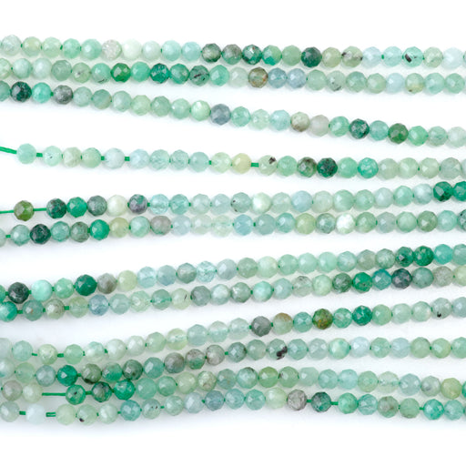 This is a Dakota Stones 3mm Emerald Banded Gemstone strand with faceted round beads in 15-16 inch strand.