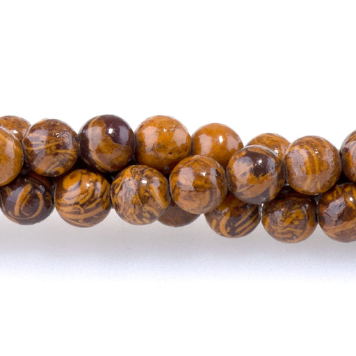 This is a Dakota Stones 4mm Elephant Skin Jasper Gemstone strand with round beads in 15-16 inch strand.