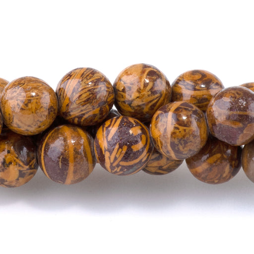 This is a Dakota Stones 6mm Elephant Skin Jasper Gemstone strand with round beads in 15-16 inch strand.