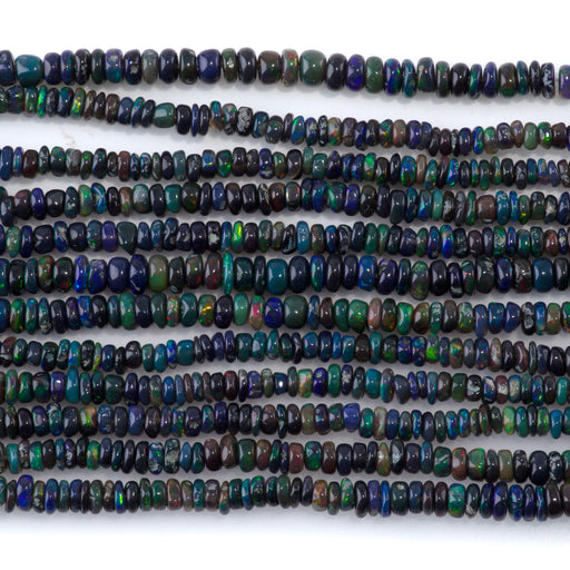 This is a Dakota Stones 1x2-5-3x5mm Ethiopian Opal Gemstone strand with irregular rondelle beads in 15-16 inch strand.