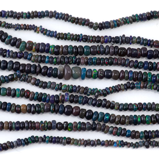 This is a Dakota Stones 1x2-3x4mm Ethiopian Opal Gemstone strand with irregular rondelle beads in 15-16 inch strand.