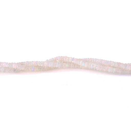 This is a Dakota Stones 3-4mm Ethiopian Opal Gemstone strand with rondelle beads in 15-16 inch strand.