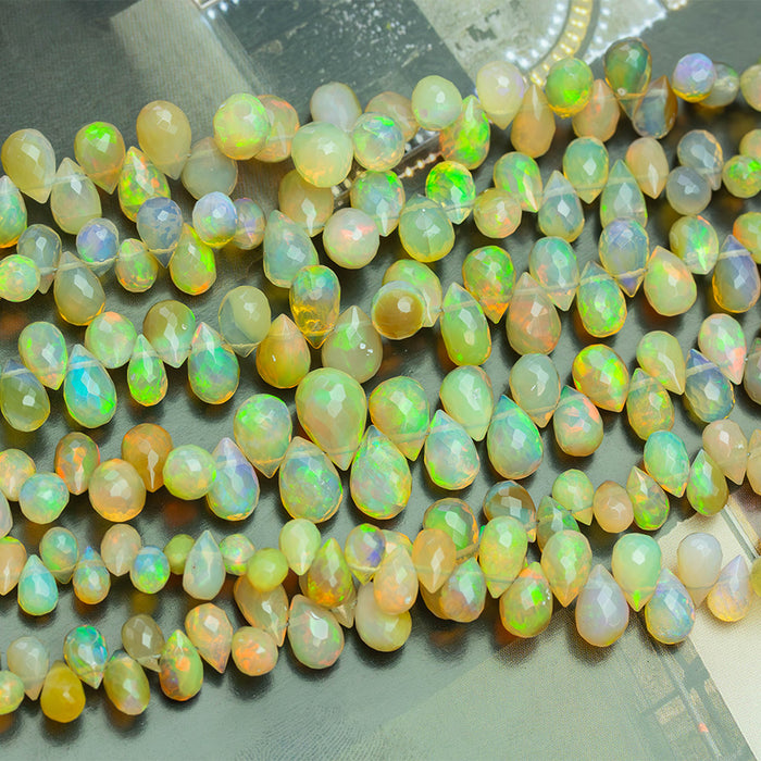 Dark Yellow Ethiopian Opal 3x5-7x10mm Graduated Faceted Drop - 15-16 Inch