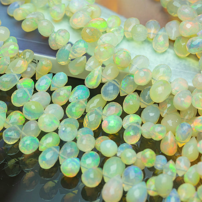 Light Yellow Ethiopian Opal 3x5-7x10mm Graduated Faceted Drop - 15-16 Inch