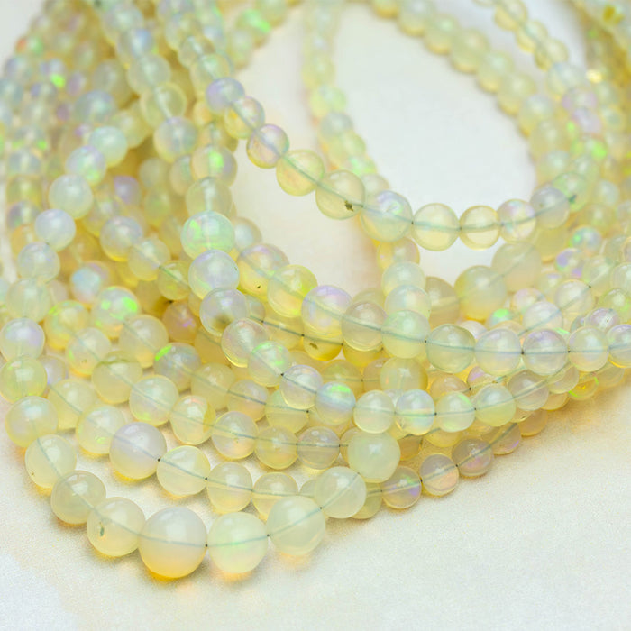 Yellow Ethiopian Opal 4-7mm Graduated Round - 15-16 Inch