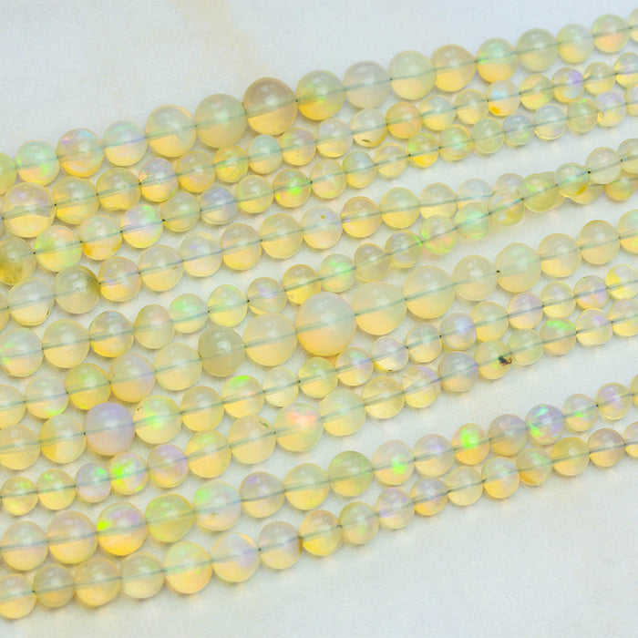 Yellow Ethiopian Opal 4-7mm Graduated Round - 15-16 Inch