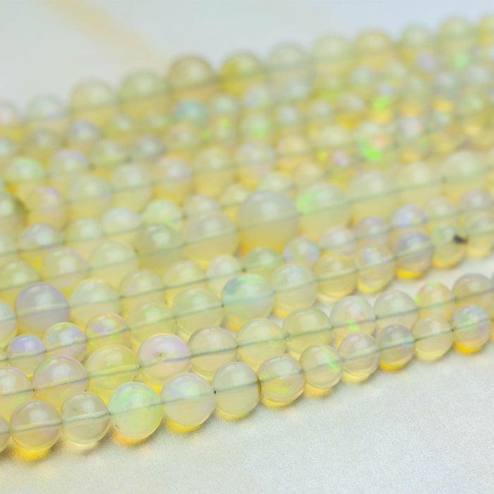 Yellow Ethiopian Opal 4-7mm Graduated Round - 15-16 Inch