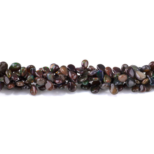 This is a Dakota Stones 5-10mm Ethiopian Opal Brown Gemstone strand with heart beads in 15-16 inch strand.