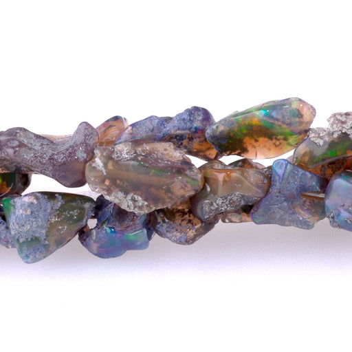 This is a Dakota Stones 5-11mm Ethiopian Opal Green Gemstone strand with nugget beads in 15-16 inch strand.