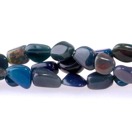 This is a Dakota Stones Ethiopian Opal Black pebble from the Dakota Stones collection.
