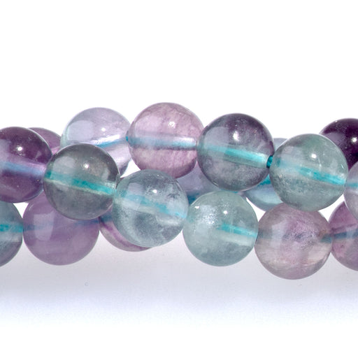 This is a Dakota Stones 6mm Fluorite Gemstone strand with A grade round beads in 15-16 inch strand.
