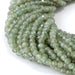 This is a Dakota Stones 4mm Green Apatite Gemstone strand with faceted round beads in 15-16 inch strand.
