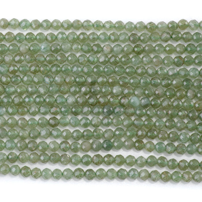 This is a Dakota Stones 4mm Green Apatite Gemstone strand with faceted round beads in 15-16 inch strand.