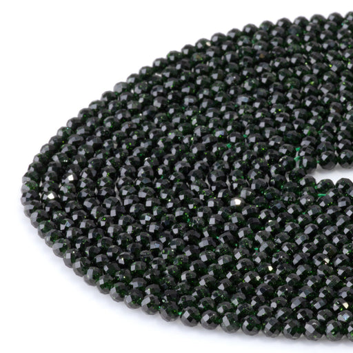 This is a Dakota Stones 4mm Green Goldstone Microfaceted Gemstone strand with round beads in 15-16 inch strand.