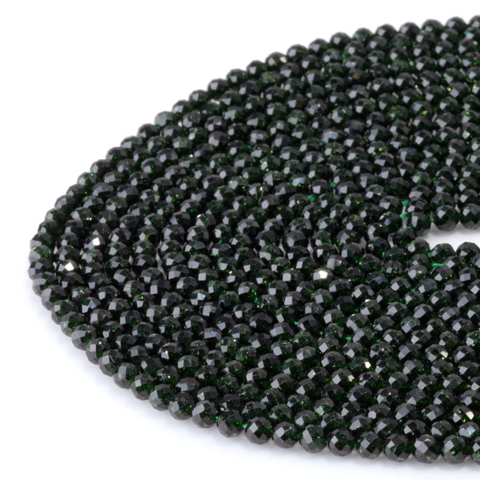 This is a Dakota Stones 4mm Green Goldstone Microfaceted Gemstone strand with round beads in 15-16 inch strand.