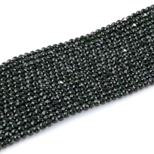 This is a Dakota Stones 4mm Green Goldstone Microfaceted Gemstone strand with round beads in 15-16 inch strand.