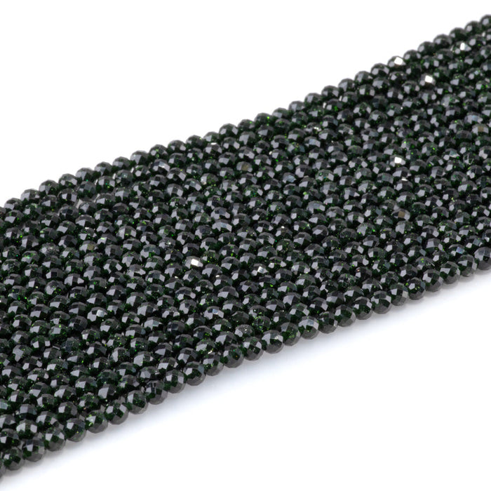 This is a Dakota Stones 4mm Green Goldstone Microfaceted Gemstone strand with round beads in 15-16 inch strand.