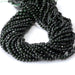 This is a Dakota Stones 4mm Green Goldstone Microfaceted Gemstone strand with round beads in 15-16 inch strand.